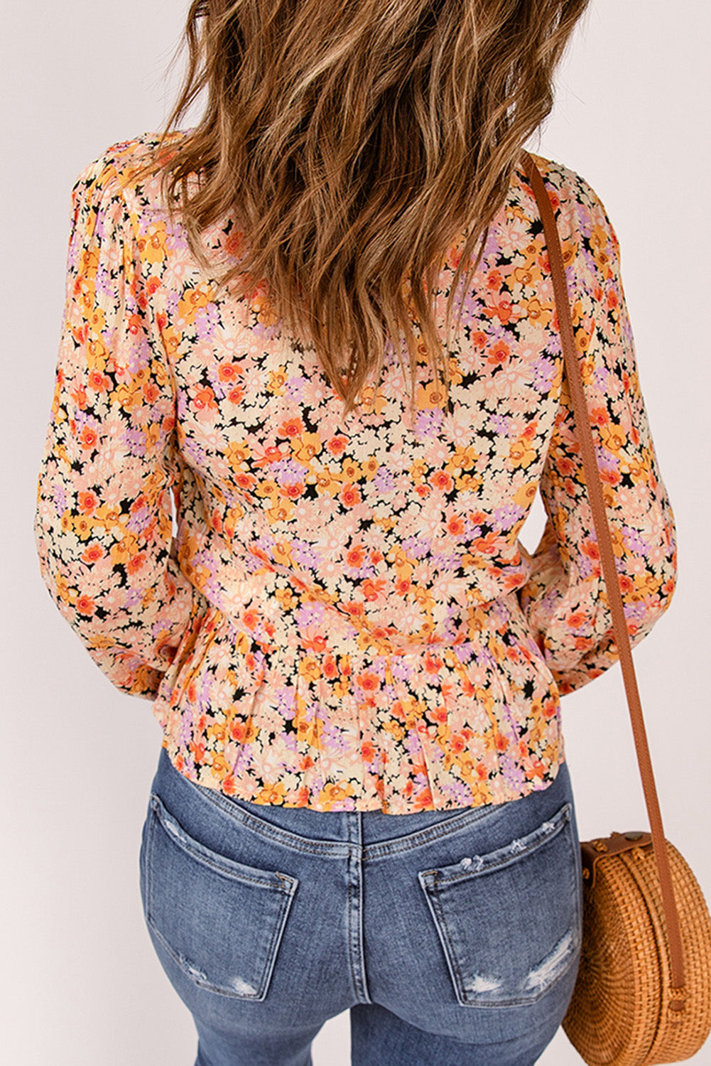 'Aria' Floral Buttoned Plunge Peplum Blouse